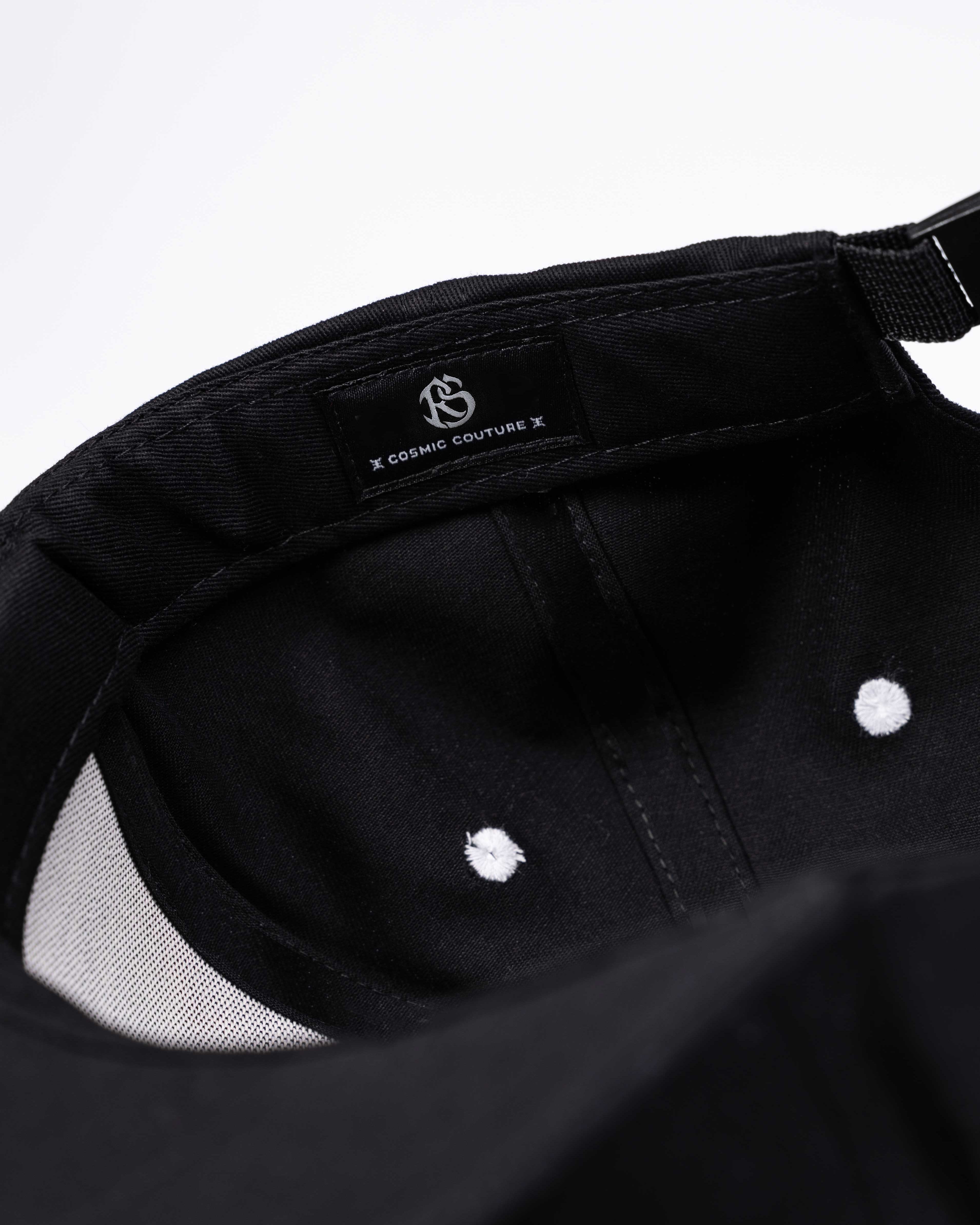 RAWSTAR Solaris Trucker Hat in black – interior label close-up “Made in Italy”, exclusive drop. Close up.