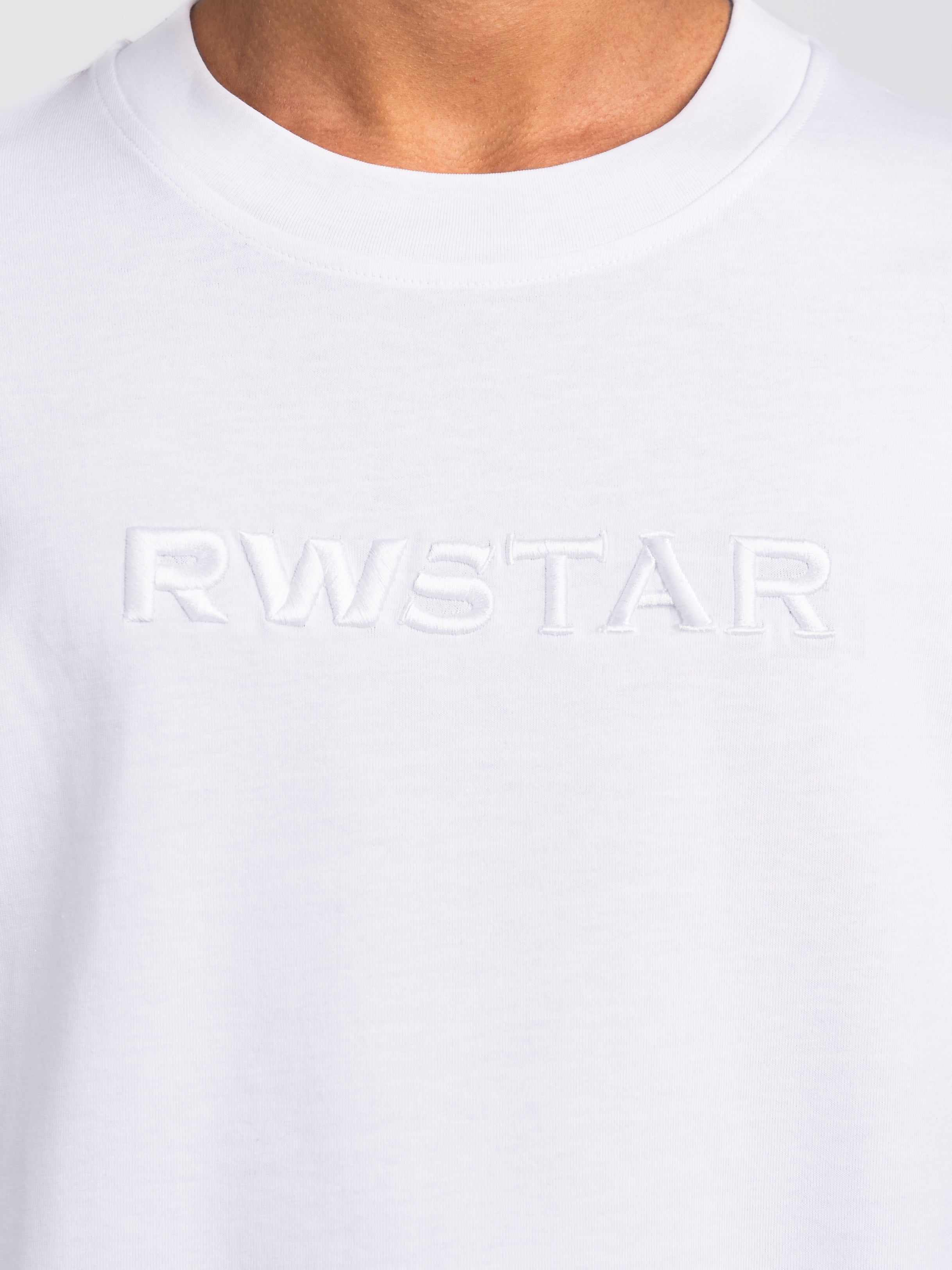 RAWSTAR Antares Acronym T-Shirt in white – packaging detail shot, exclusive limited edition drop.