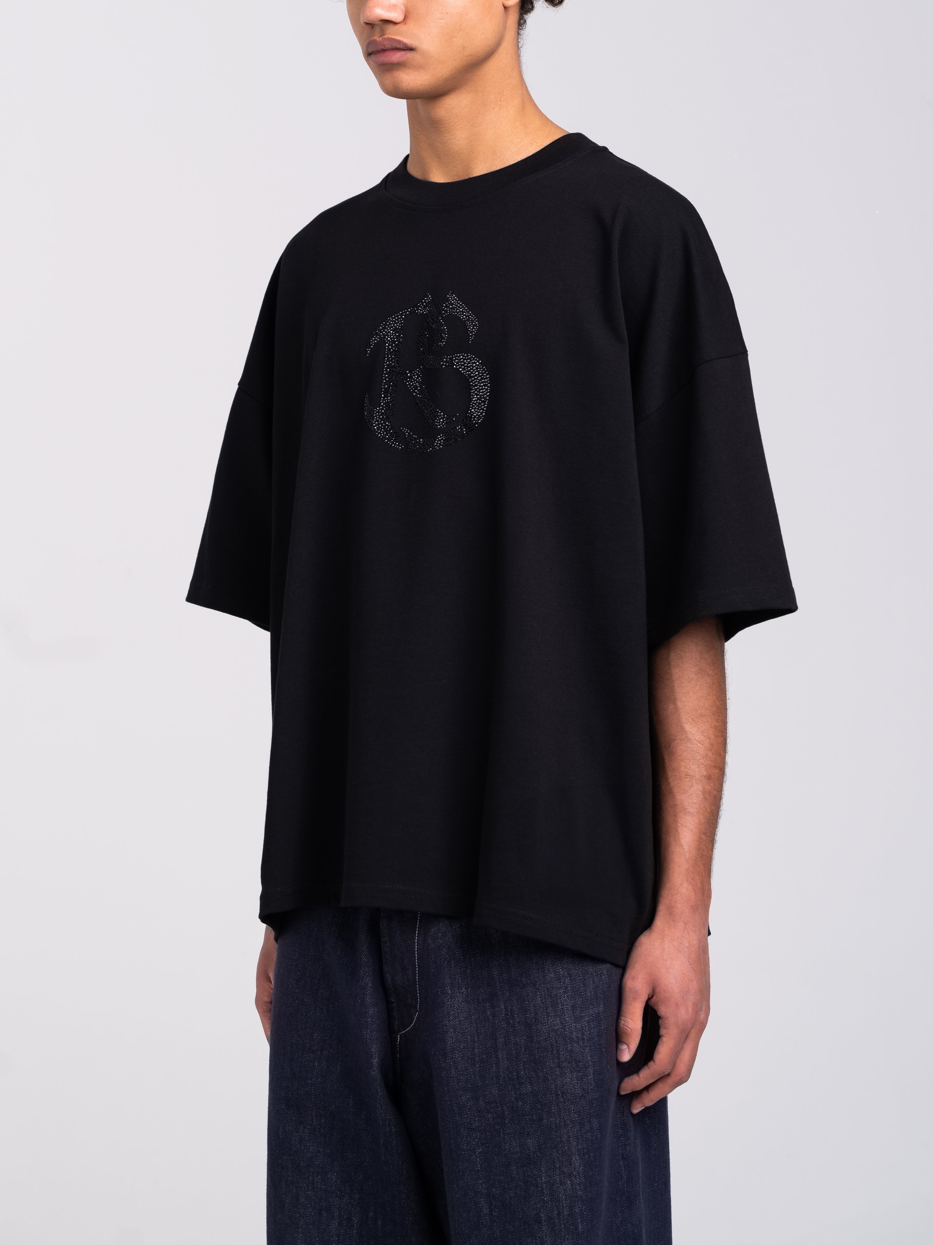 RAWSTAR Antares Astra Stellar T-Shirt in black – side view of model wearing the tee, luxury streetwear made in Italy.