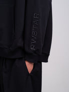 RAWSTAR Sirio Sweatshirt in black – close-up of sleeve print detail and premium material, Made in Italy.