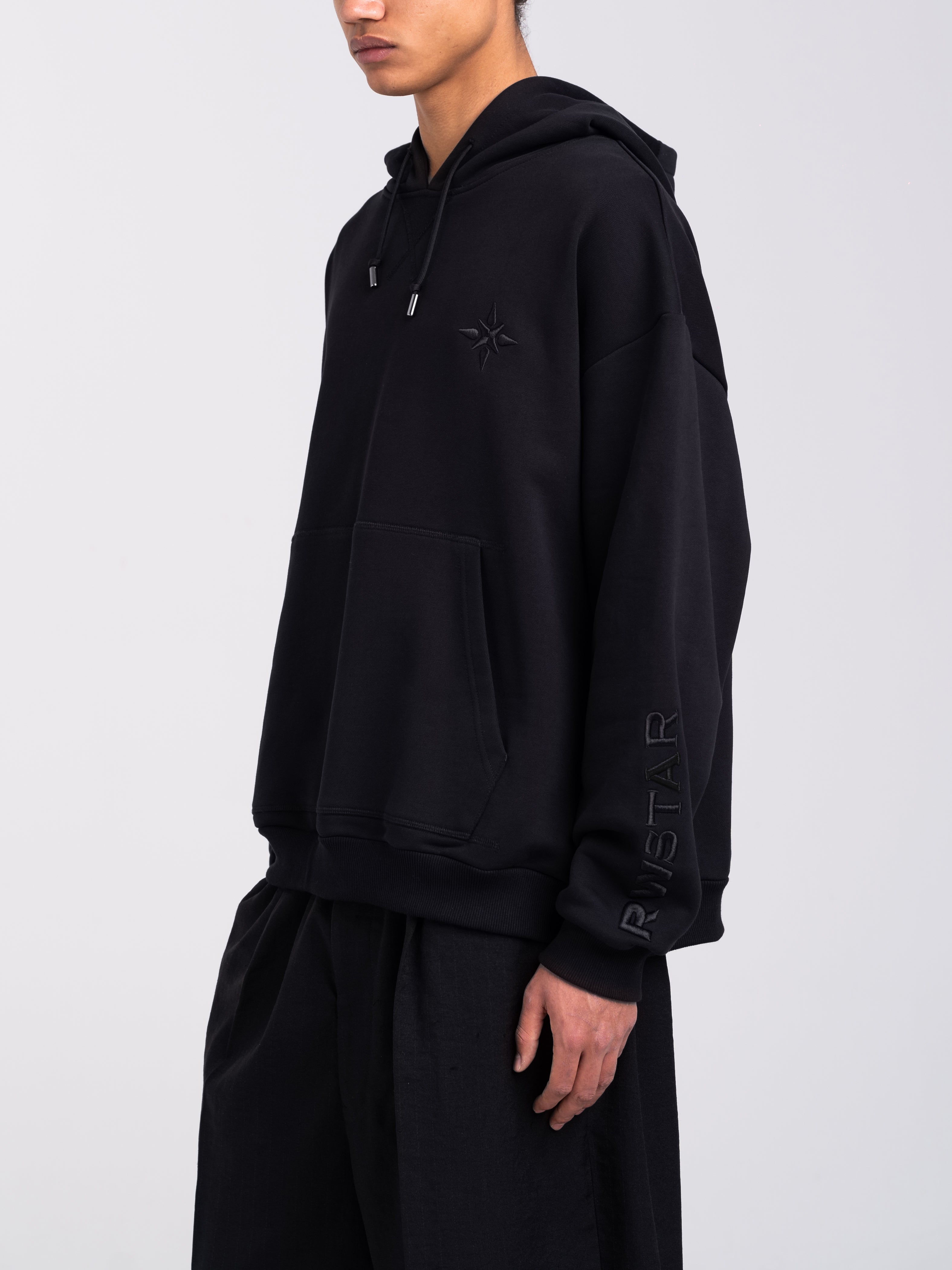 RAWSTAR Sirio Sweatshirt in black – side view on model, oversized fit with premium Italian finish.
