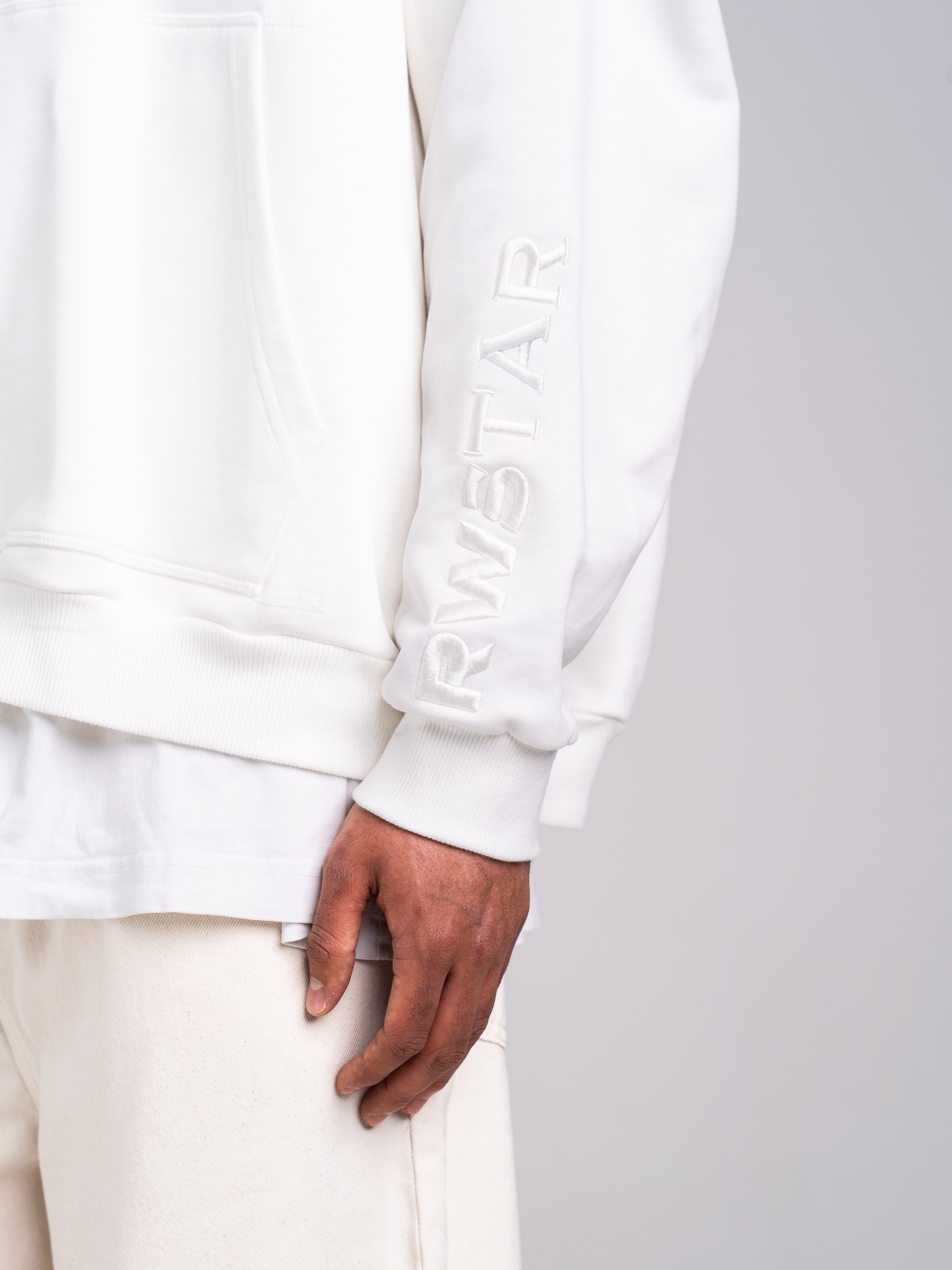 RAWSTAR Sirio Sweatshirt in white – detail of sleeve print/branding, premium materials, Made in Italy.